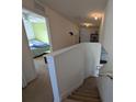 Upper hallway with access to bedrooms and stairs at 108 Emeraldview Ave, Davenport, FL 33897