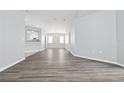 Dining room with chandelier and wood-look flooring at 2003 Rocky Pointe Dr, Lakeland, FL 33813