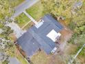 Aerial view showcasing the house's layout and backyard at 803 E Valencia St, Lakeland, FL 33805