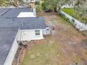 View of the home's backyard, showing a large open space at 803 E Valencia St, Lakeland, FL 33805