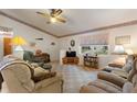 Cozy living room with comfortable seating at 4680 Poinciana Dr, Indian Lake Estates, FL 33855