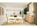 Bright dining room with light wood table and chairs, and an accent wall at 7310 Ivy Tendril Ave, Orlando, FL 32829