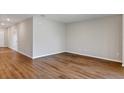 Bright living room with hardwood floors and neutral walls at 2204 Canyon Oak Dr, Davenport, FL 33837