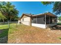 House with screened porch and fenced backyard at 5018 Se 106Th Pl, Belleview, FL 34420