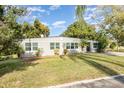 House exterior showcasing a well-maintained lawn at 5883 Dogwood Dr, Orlando, FL 32807