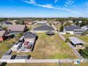 Overhead view showing the house, backyard, and surrounding neighborhood at 164 Sunrise Hill Ln, Auburndale, FL 33823