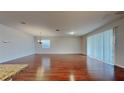 Spacious dining area with hardwood floors and chandelier at 3537 Raleigh Dr, Winter Haven, FL 33884