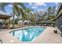 Inviting swimming pool with a spacious patio area at 2028 Marker Rd, Polk City, FL 33868