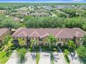 Townhome community with lush landscaping at 225 Cambria Ave, Davenport, FL 33897