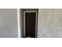 Condo building entry door with number 230 at 713 Crest Pines Dr # 236, Orlando, FL 32828