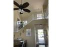 Bright and spacious entryway with a staircase leading upstairs at 190 Post Way, Casselberry, FL 32707