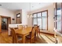 Dining room with hardwood floors and a wooden table at 3060 Granada Dr, Indian Lake Estates, FL 33855