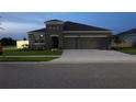 Lovely single-Gathering home with a well-manicured lawn and a two-car garage at 400 Watusi Way, St Cloud, FL 34772