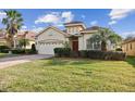 Well-maintained single-Gathering home with a lush green lawn and attractive landscaping at 1713 Altavista Cir, Lakeland, FL 33810