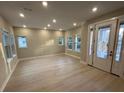 Bright living room featuring large windows and natural light at 1630 Haven Dr, Orlando, FL 32803