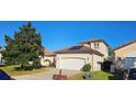 Charming single Gathering home with a two car garage, tile roof and solar panels on the roof at 315 Villa Sorrento Cir, Haines City, FL 33844