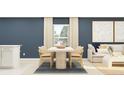 Stylish dining room with modern furnishings adjacent to a living area, creating an open concept at 1325 Acorn Meadow Loop, Eustis, FL 32726