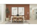 Inviting dining area with earth tone wall, neutral decor and modern style at 1337 Acorn Meadow Loop, Eustis, FL 32726
