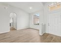 Bright living room with neutral paint, light floors, and plenty of natural light at 2726 Herons Landing Dr, Kissimmee, FL 34741