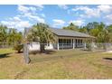 Well maintained home featuring ample space and secure fencing, creating a safe and private outdoor retreat at 15675 Sw 33Rd St, Ocala, FL 34481