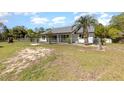 Expansive yard showcasing ample space and secure fencing, creating a safe and private outdoor retreat at 15675 Sw 33Rd St, Ocala, FL 34481