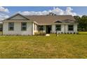 Inviting single-story home with a neat lawn and a welcoming front entrance at 2569 Rogers Rd, Lakeland, FL 33812
