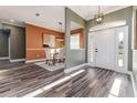 Charming home foyer with stylish floors and easy access to the dining room at 725 Giant Oak Rd, Lakeland, FL 33810