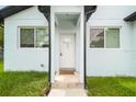 Inviting front entrance with a well-maintained lawn and a clear view at 2216 W Lanier St, Lakeland, FL 33815