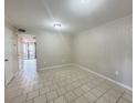 Bright living room with tile flooring and ample natural light at 1424 Ridge Lake Ct, Lakeland, FL 33801