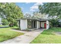 Charming single-story home featuring modern design and appealing curb appeal at 407 W Oak Dr, Lakeland, FL 33803