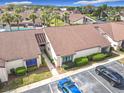 Charming single-story home featuring verdant landscaping, and ample parking at 101 Grand Plaza Dr. # P-3, Orange City, FL 32763