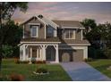 Charming two-story home with classic design elements and well-manicured lawn at 3611 Chelsea St, Orlando, FL 32803