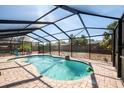 Inviting screened in pool area with brick patio at 4089 Lehman Ln, Lakeland, FL 33813