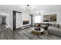 Bright living room featuring a fireplace and elegant decor at 1508 Leighton Ave, Lakeland, FL 33803