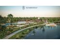 Sunbridge community featuring a swimming pool, clubhouse, and lake at 3089 Voyager Ave, St Cloud, FL 34771