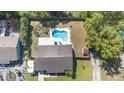 Aerial view showcasing a large backyard with a pool, shed, and wooden deck at 820 Rio Ala Mano Dr, Altamonte Springs, FL 32714