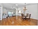Spacious living and dining area featuring hardwood floors and abundant natural light at 15213 Sw 14Th Avenue Rd, Ocala, FL 34473