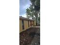 This home features a well-maintained exterior with tasteful landscaping at 31632 Spruce Dr, Eustis, FL 32736