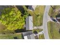 An overhead view of a charming home with well-maintained landscaping and curb appeal at 5728 Ne 21St Avenue Rd, Ocala, FL 34479
