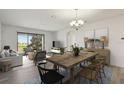 Open-concept living and dining area with modern decor and lots of natural light at 8983 Azalea Sands Ln # 8983, Davenport, FL 33896