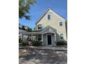 Inviting two-story townhome with a covered entrance and well-maintained landscaping at 3324 Parkchester Square Blvd # 102, Orlando, FL 32835