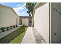 Exterior view of home and yard at 2249 Cypress Cove Dr # E3, Tavares, FL 32778