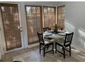 Cozy breakfast nook featuring a round table set for four, with lots of natural light at 645 W Winter Park St, Orlando, FL 32804