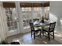 Cozy breakfast nook featuring a round table set for four, with lots of natural light at 645 W Winter Park St, Orlando, FL 32804