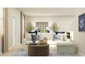 Comfortable living room with a white sofa, stylish decor, and a cozy atmosphere at 2268 Red Sun Way, Apopka, FL 32703