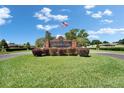 Welcome to Hunters Run, a beautiful community with lush landscaping and a welcoming entrance at 7402 Gunstock Dr, Lakeland, FL 33809