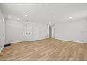Spacious living room with hardwood flooring and ample natural light at 438 Cotswold Cir, Davenport, FL 33837