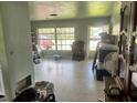 Living room showing a large window and open space at 617 Vandenberg St, Altamonte Springs, FL 32701