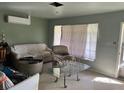 Cozy living room featuring a comfortable seating arrangement and natural light at 617 Vandenberg St, Altamonte Springs, FL 32701