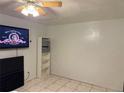 Simple bedroom with light tile floors, neutral walls, and ceiling fan at 612 Acapulca Way, Altamonte Springs, FL 32714